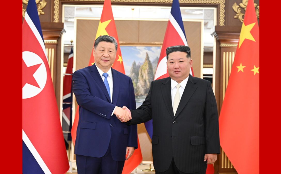 习近平同金正恩举行会谈