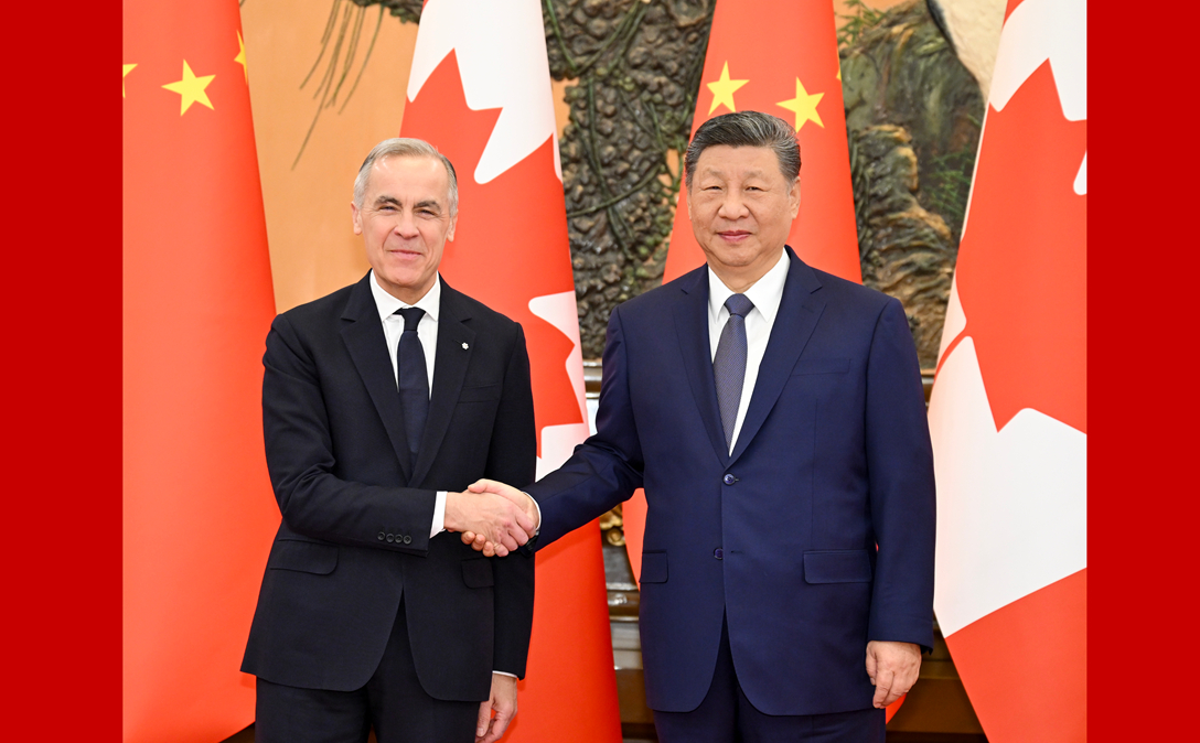 习近平会见加拿大总理卡尼