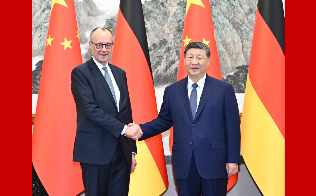 习近平会见德国总理默茨